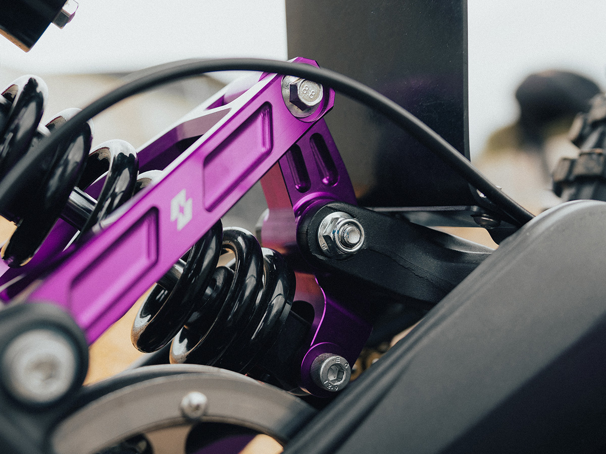 Full-E Charged Reinforced Suspension Linkage With Roller Bearings Purple