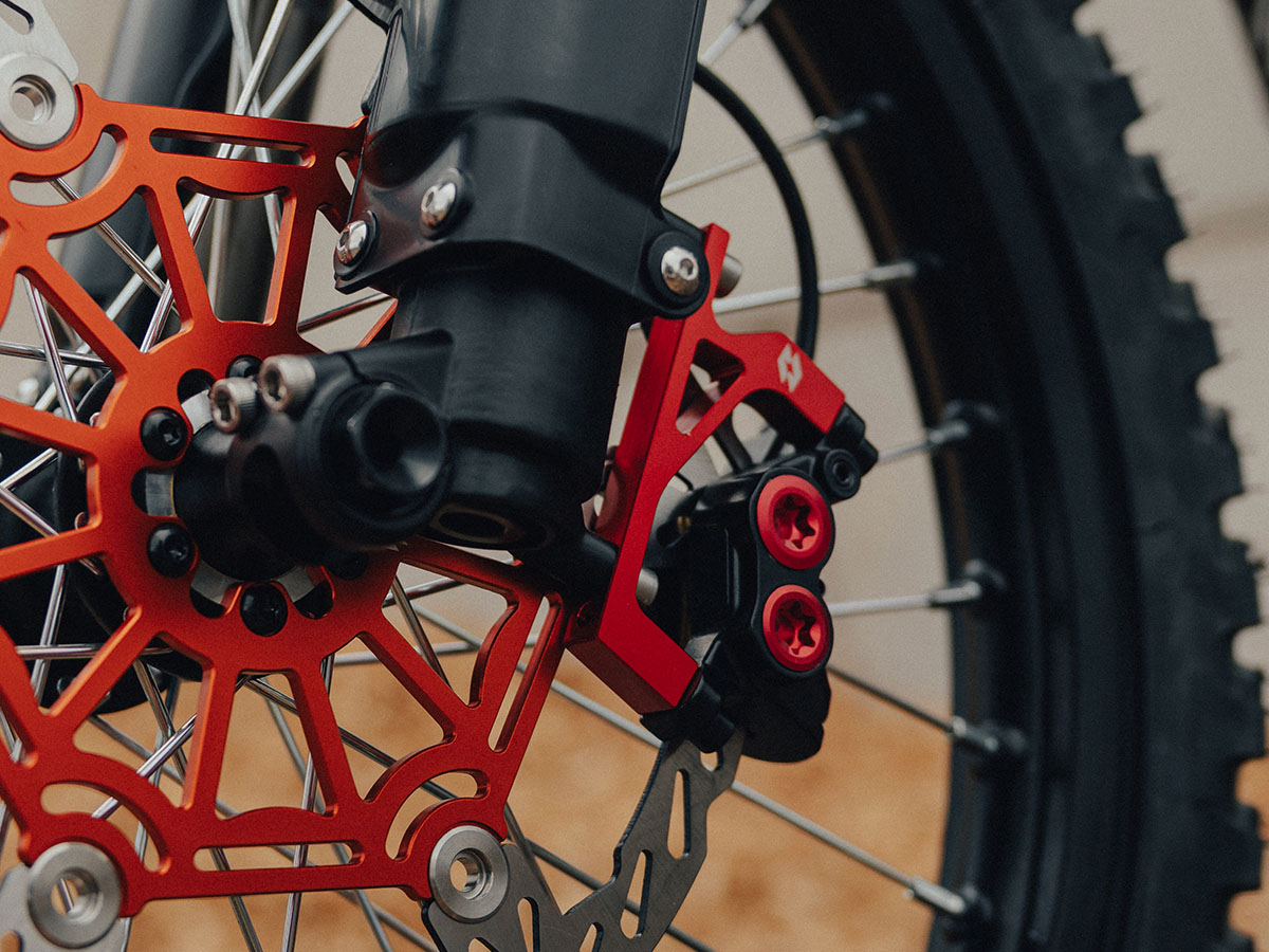 Full-E Charged Front Brake Caliper Bracket for 250mm Oversized Disc Red